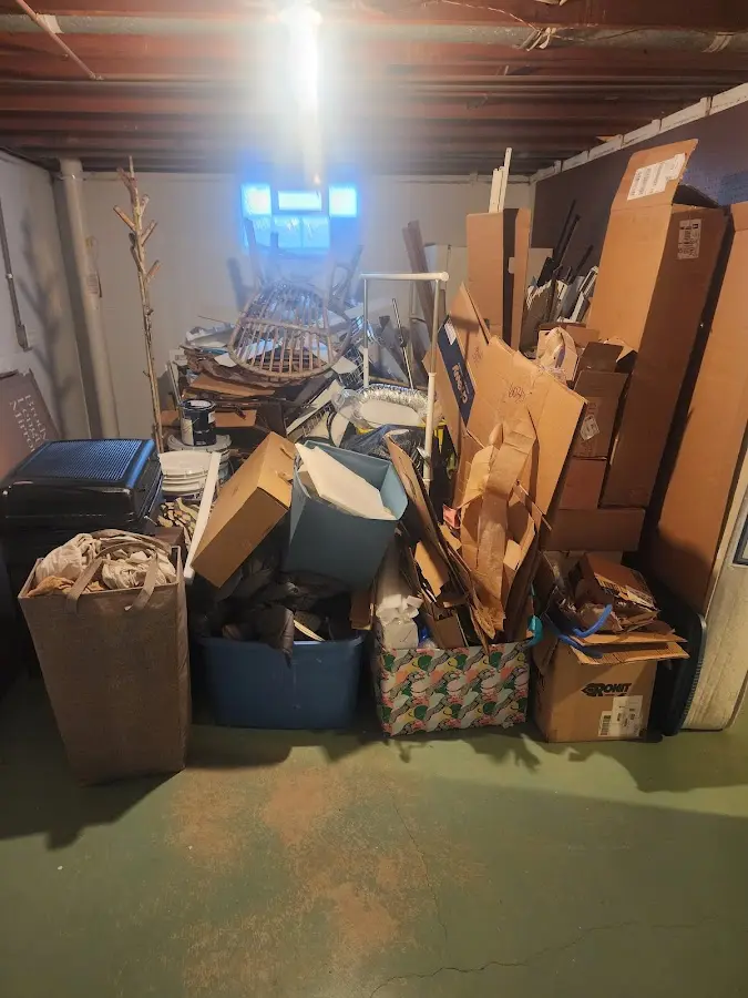 Roll-off dumpster container at job site for 2 Yard Dumpster Rental in Newtown